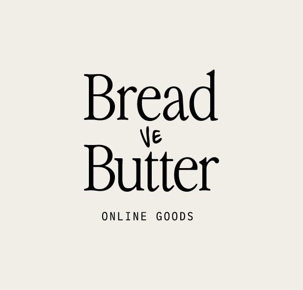 Graphic of a typography specimen showing the alphabet and numerals on top of a dark gray background.